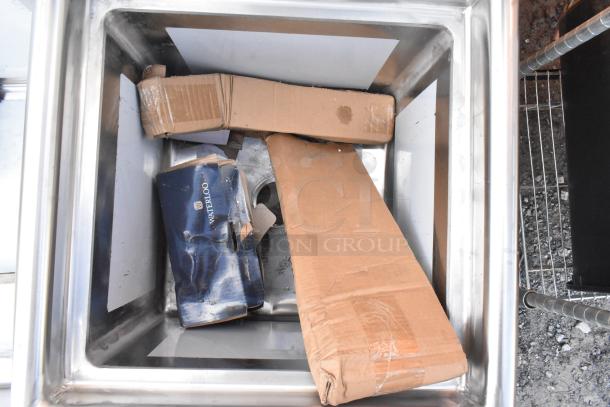 Regency 600S11818 stainless steel single bay sink, brand new, minor dents visible, includes original packaging.