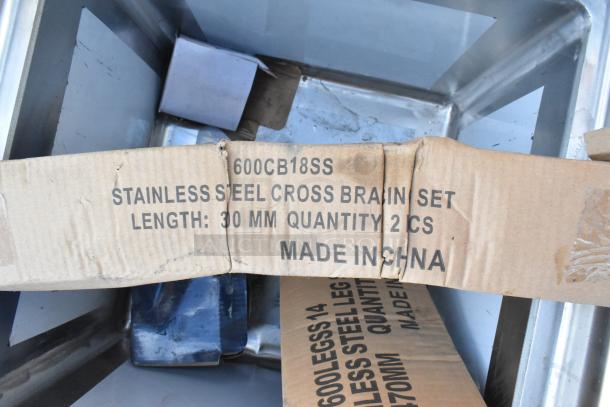 BRAND NEW SCRATCH AND DENT! Regency 600S11818 stainless steel single bay sink, box with "Stainless Steel Cross Brain Set" label.