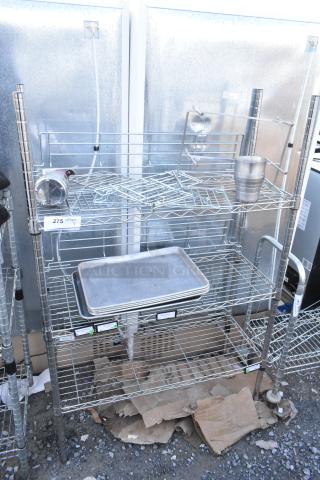 Chrome finish 3-tier wire shelving unit with metal baking pans, dismantling required, consider freight charges.