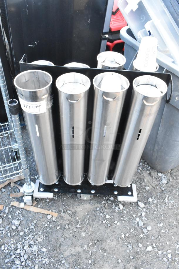 Metal 8 chute cup dispenser with commercial casters. Features stainless steel tubes, mounted on black base. Includes auction tag #277.