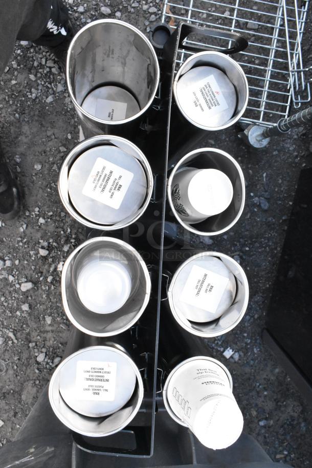 Metal 8 Chute Cup Dispenser with labels, mounted on commercial casters. Used for dispensing various cup sizes.