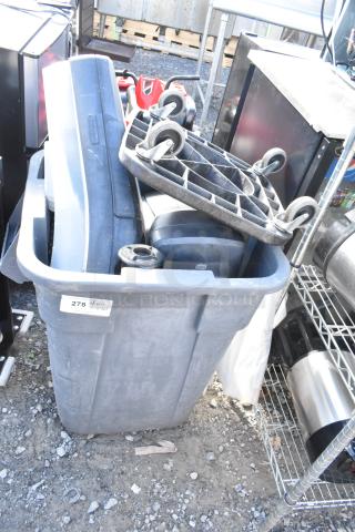 Gray poly trash can with a dolly and metal silverware bins inside, tag marked "278". Good condition.