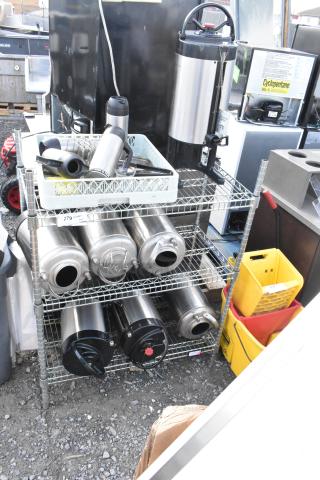 Chrome finish 3 tier wire shelving with tanks and equipment, condition fair. Buyer must dismantle and consider freight charges.