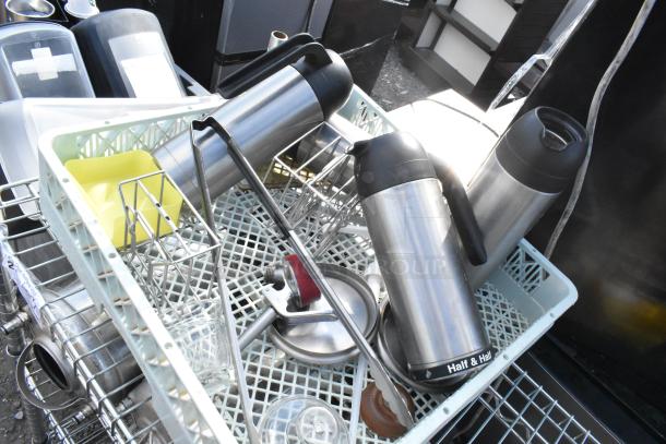 Chrome finish 3-tier wire shelving unit with assorted kitchenware and tanks, includes dismantling instructions.