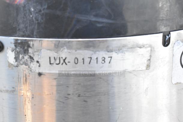 Chrome finish wire shelving unit, LUX-017187 marking. Contains tanks. Buyer disassembles. Consider freight charges.