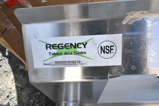 Alt text: Brand new Regency 70" stainless steel three-compartment sink, model 600S31416212, with no legs, NSF certified.