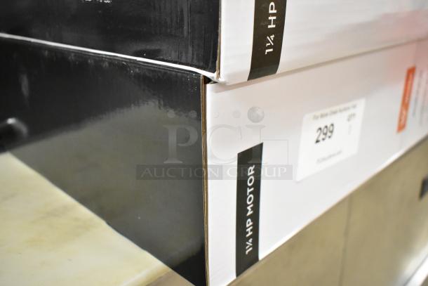 Box labeled "1 1/4 HP Motor" for a new AvaMix 928IBHDW10 Heavy-Duty Immersion Blender with 10" Whisk, showing scratch and dent condition.