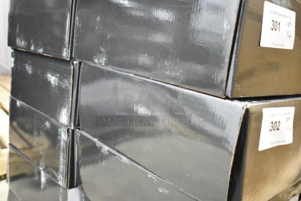 Stacked black boxes containing AvaMix 928IBHDW10 immersion blenders, labels with item numbers and auction info visible.