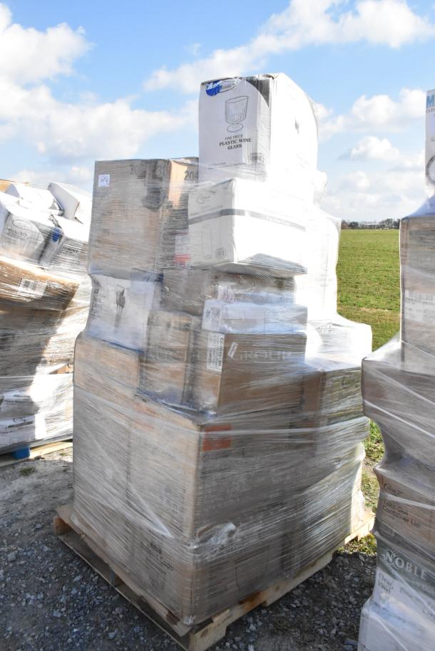 Pallet of 31 new scratch and dent items, including foam trays, dessert cups, can liners, champagne flutes, napkins, in wrapped boxes.
