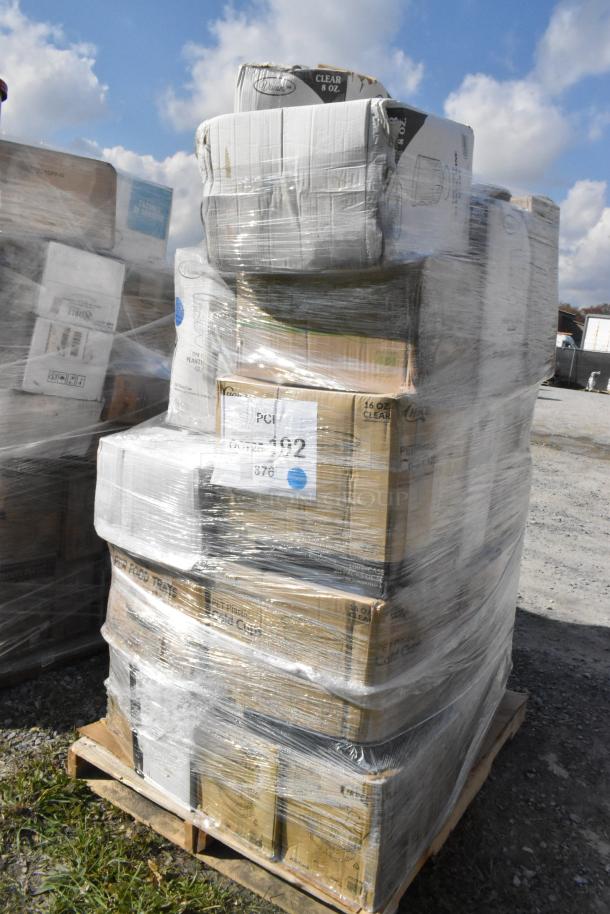 Shrink-wrapped pallet of 31 new scratch and dent items, including foam trays, dessert cups, can liners, and champagne flutes.