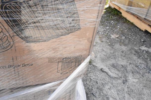 Pallet of 34 scratch and dent items shrink-wrapped, includes cold cups, plates, and containers. Box marked "Made in China".