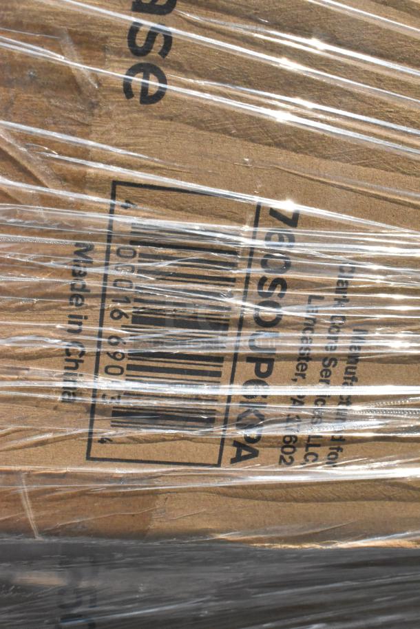 Plastic-wrapped pallet containing brand new scratched and dented items, including cups, plates, and containers. Marked "Made in China."