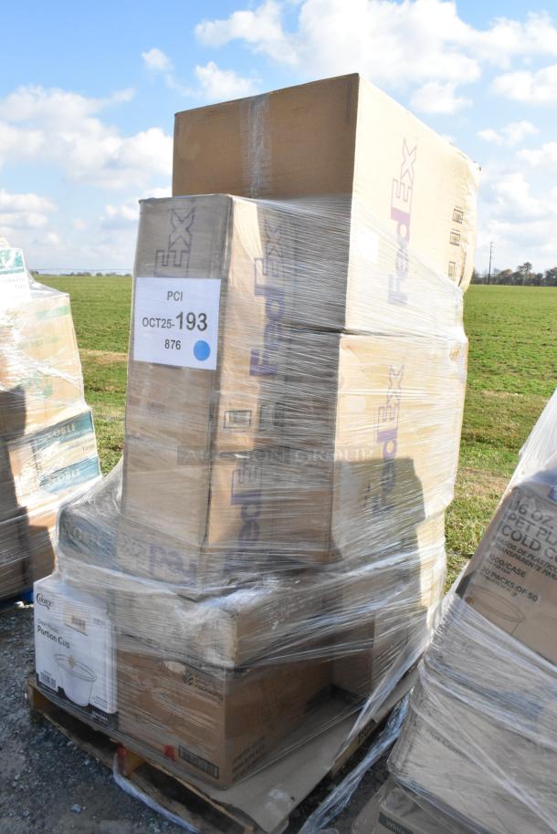 Pallet with 14 new scratch and dent items, including towels, portion cups, plates, and gloves, wrapped in FedEx boxes.