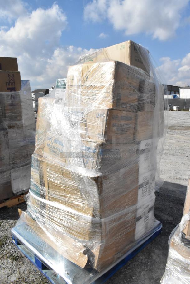 Pallet of assorted scratch and dent items, including gloves, ice bucket, and towels, wrapped in plastic. Brand labels visible.