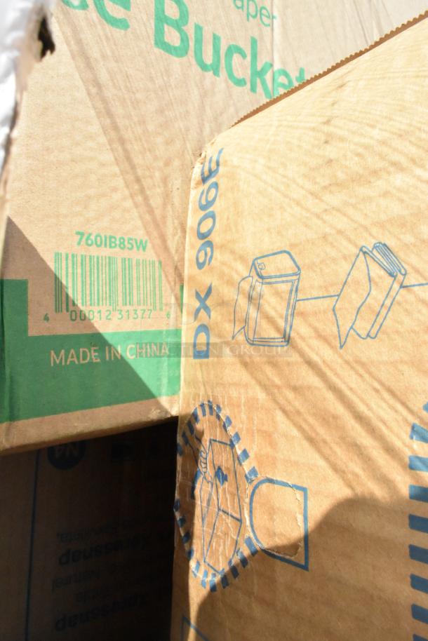 Cardboard box labeled "Made in China" with product codes. Contains 23 new scratch and dent items like gloves, ice bucket, and towels.