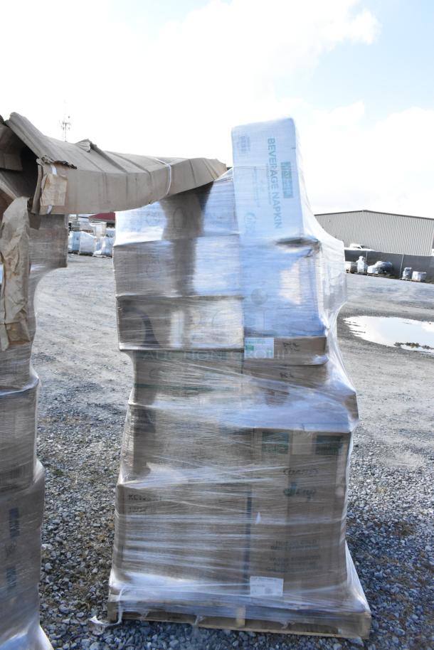 Pallet of mixed items wrapped in plastic, including napkins, plates, gloves, and more, labeled "Beverage Napkin," scratch and dent condition.