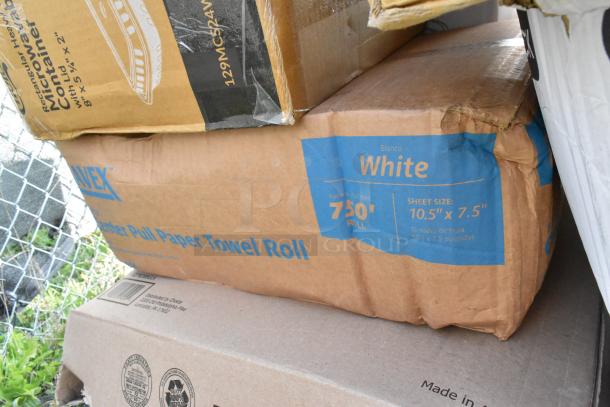 Cardboard boxes showing scratch and dent items, including microwave containers and paper towel rolls, indicating 27 items.