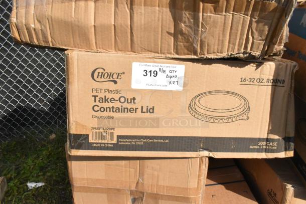 Cardboard box of Choice PET plastic take-out container lids, showing signs of scratching and denting. 27 items per bid.
