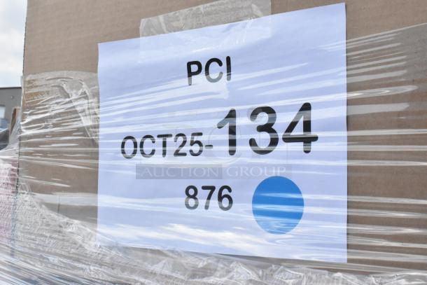 Cardboard box wrapped in plastic with a label reading "PCI OCT25-134 876" and a blue circle marking.