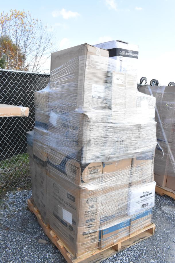 Pallet of 34 boxed items wrapped in plastic, including gloves, cup lids, and churro bags. Scratch and dent condition.