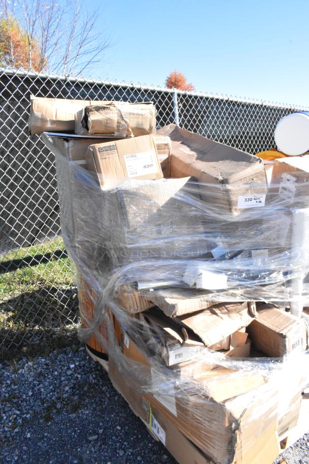 Pallet of 28 new scratch and dent items, wrapped in plastic. Includes wine glasses, burger press. Box labels visible.