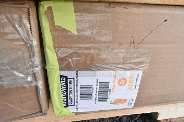 Cardboard box marked with Kraft Heinz mustard dispenser label, 15-gallon capacity, new condition, scratch and dent sale.