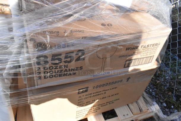 Boxed items wrapped in plastic, labeled as Libbey wine tasters, 2 dozen per box. Note mentions "missing 2 glasses."