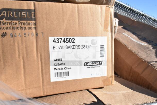 Cardboard box labeled "4374502 BOWL BAKERS 28 OZ" by Carlisle, containing 12 white bowls, made in China.