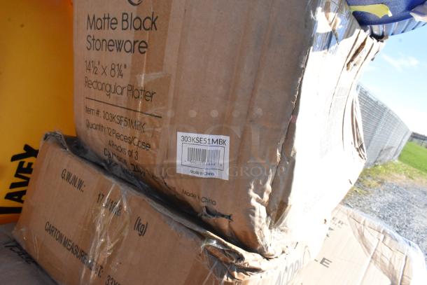 Boxes of matte black stoneware rectangular platters, item #303KSE51MBK, 12 pieces per case, slight packaging damage.