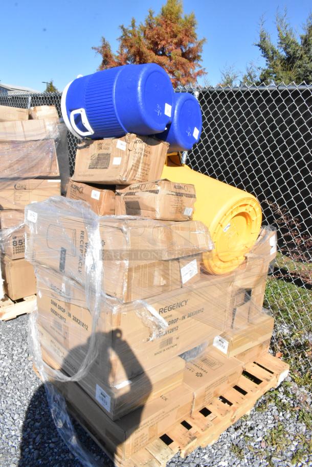 22 new scratch and dent items on a pallet, including blue Igloo beverage coolers, Regency sink packaging, and more.