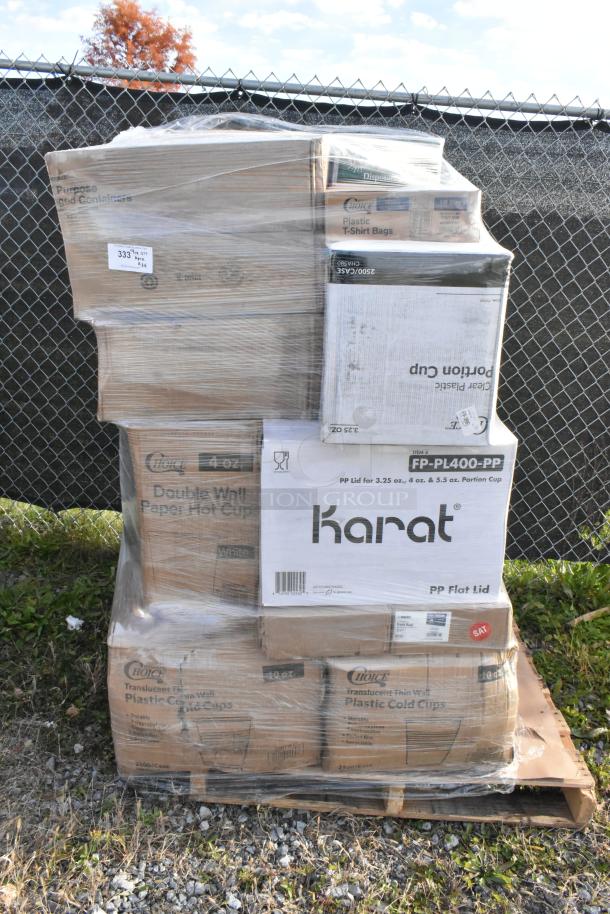 Pallet of 34 brand new items including foil, gloves, can liners, portion cups, and T-shirt bags, wrapped in plastic.
