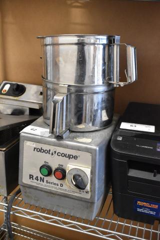 Robot Coupe R4N metal food processor with two bowls and S blade, 220V, 3-phase, visible wear, control dial, power switches.