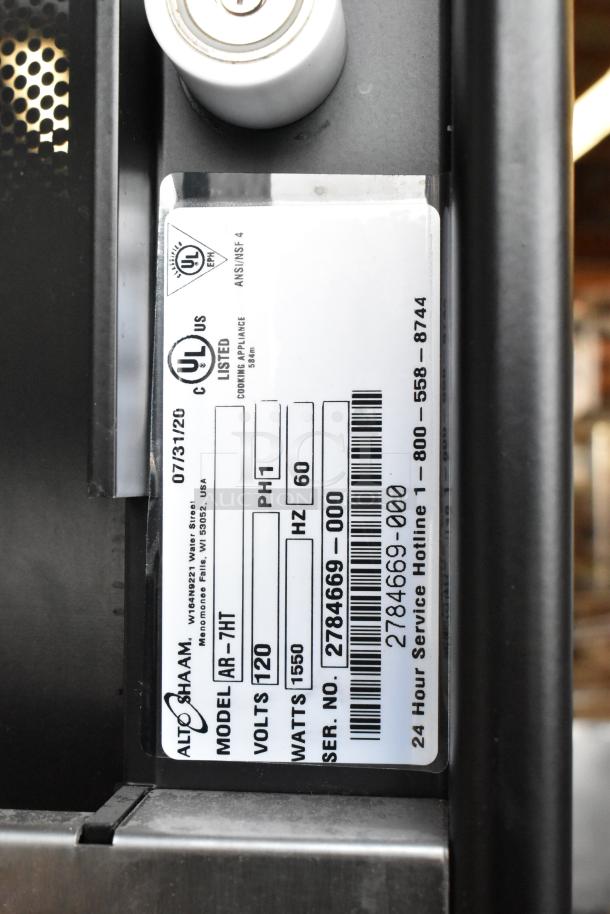 Alto Shaam AR-7HT commercial heated cabinet label showing model, 120V, 1550W, UL listed. New condition.