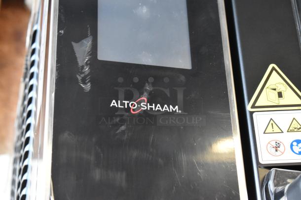 BRAND NEW 2022 Alto Shaam AR-7T Stainless Steel Commercial Rotisserie Oven, 7 Spit, 380-415V, 1 Phase, with safety labels.