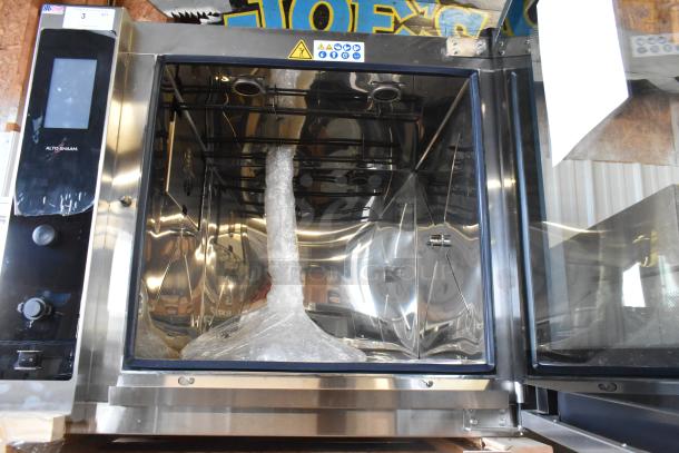 Brand new 2022 Alto Shaam AR-7T stainless steel commercial rotisserie oven, 7 spit, 380-415V, 1 phase, shown in open box.