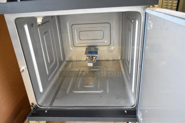 Brand new 2020 Alto Shaam 1750-SK stainless steel commercial smoker oven interior, showing pristine condition. 230V, 1 phase.