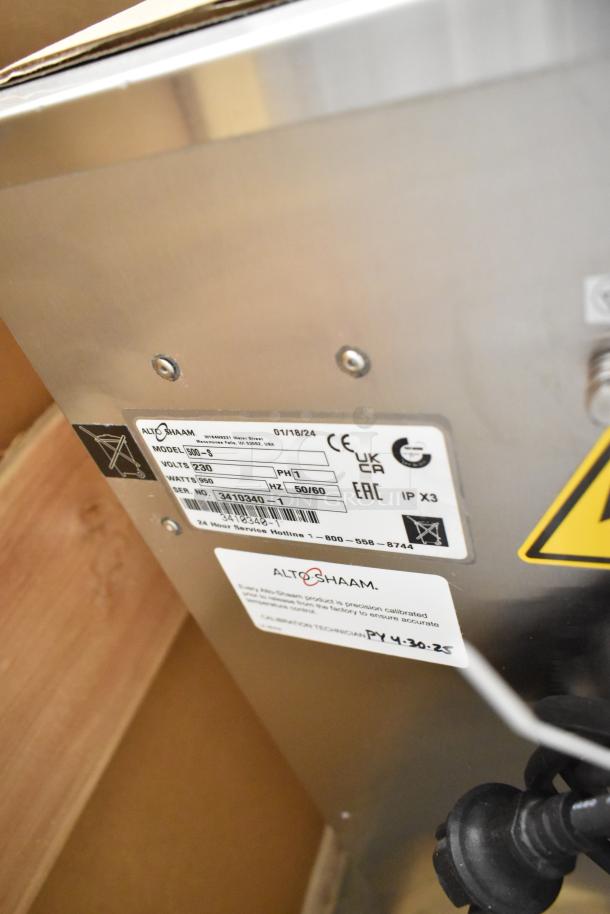 Brand new Alto Shaam 500-S stainless steel mobile holding cabinet, 230V, 1 phase, six-pan capacity, model and service labels visible.