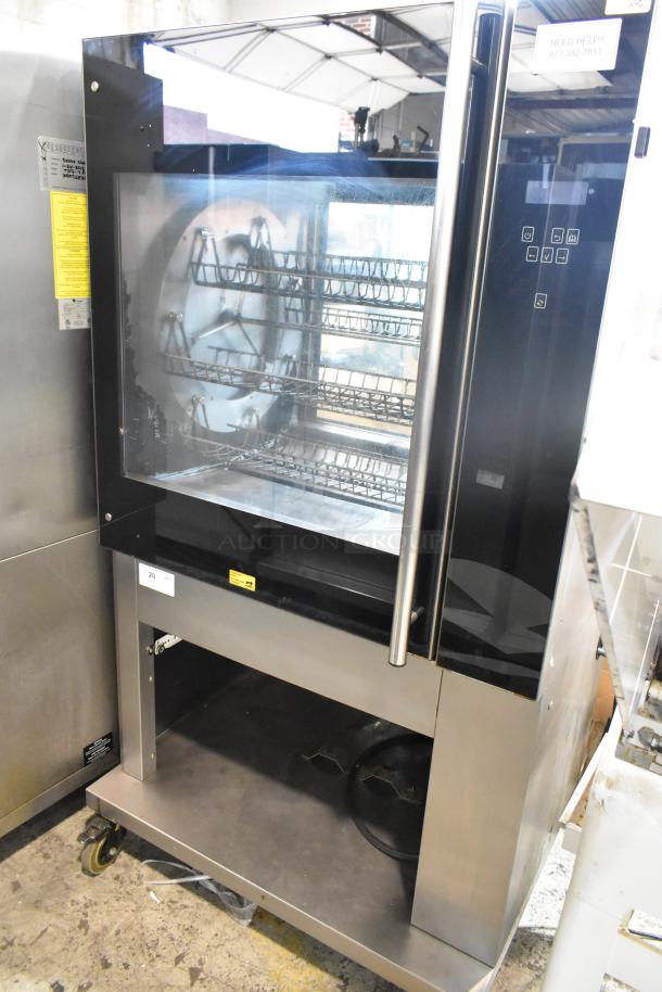 Fri-jado TDR 7-P Stainless Steel Commercial Floor Style Electric Powered Rotisserie Oven on Commercial Casters. 208 Volts, 3 Phase. - Image 1 of 9