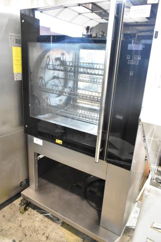 Fri-jado TDR 7-P Stainless Steel Commercial Floor Style Electric Powered Rotisserie Oven on Commercial Casters. 208 Volts, 3 Phase.