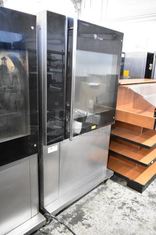 Fri-jado TDR 7-P Stainless Steel Commercial Floor Style Electric Powered Rotisserie Oven on Commercial Casters. 208 Volts, 3 Phase.
