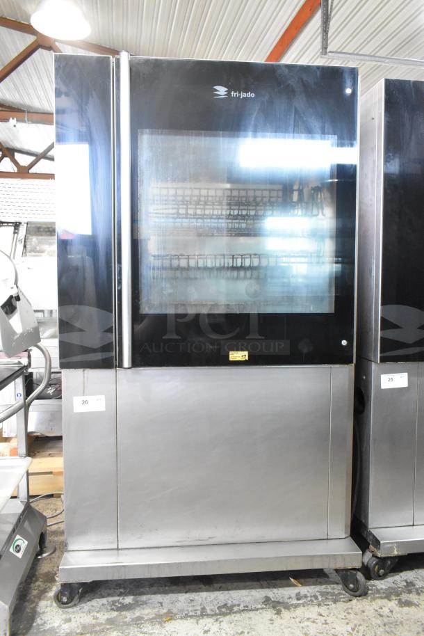 Fri-jado TDR 7-P Stainless Steel Commercial Floor Style Electric Powered Rotisserie Oven on Commercial Casters. 208 Volts, 3 Phase. - Image 1 of 6