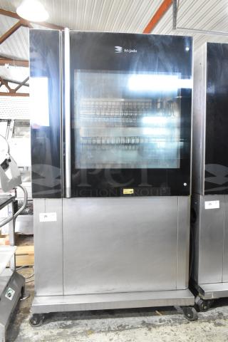 Fri-jado TDR 7-P Stainless Steel Commercial Floor Style Electric Powered Rotisserie Oven on Commercial Casters. 208 Volts, 3 Phase. - Item #1192930