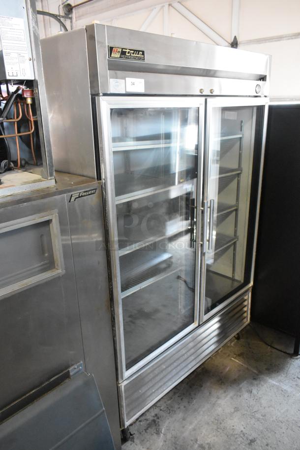 True T-49 Stainless Steel Commercial 2 Door Reach In Cooler Merchandiser w/ Racks on Commercial Casters. 115 Volts, 1 Phase. - Image 1 of 7