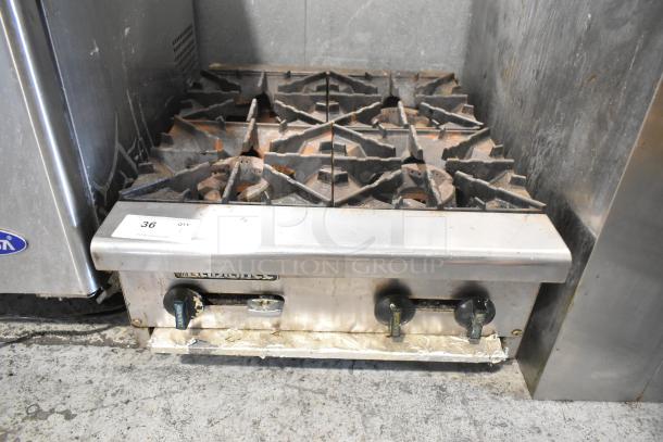 Radiance Stainless Steel Commercial Countertop Gas Powered 4 Burner Range. - Image 1 of 8
