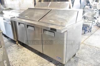 2019 Atosa MSF8308GR stainless steel prep table with bain marie top, commercial casters, 115V, 1 Phase, some wear visible.
