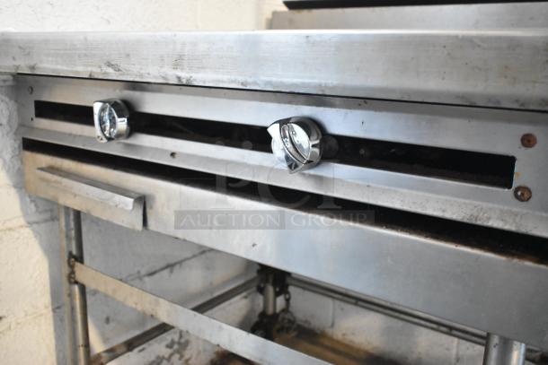 Stainless Steel Commercial Gas Powered Flat Top Griddle on Commercial Casters. - Image 3 of 8