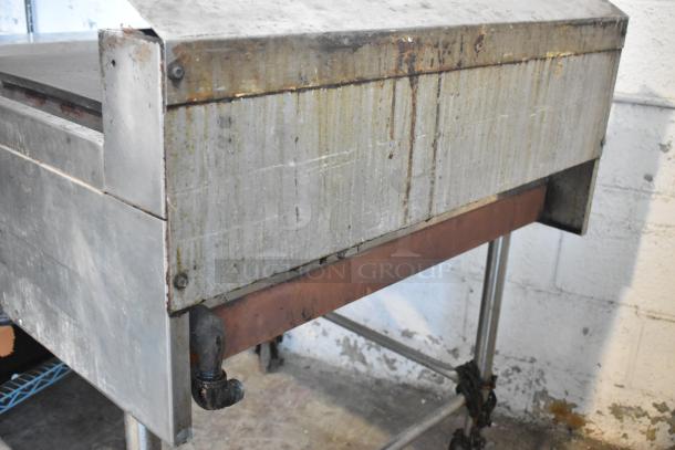 Stainless Steel Commercial Gas Powered Flat Top Griddle on Commercial Casters. - Image 7 of 8