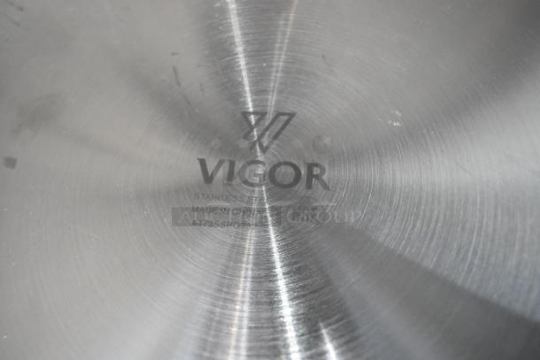 Brand new Vigor 32 qt. stainless steel stock pot with aluminum-clad base. Scratch and dent. Model #473SSPOT32.