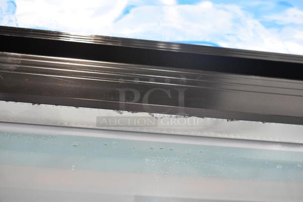 BRAND NEW SCRATCH AND DENT! 2024 Avantco 178GDC69HCB Metal Commercial 3 Door Reach In Cooler Merchandiser. See Pictures for Broken Glass. 115 Volts, 1 Phase. - Image 8 of 11