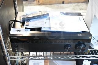 Sony STR-DH190 Stereo Receiver, 120 Volts, 1 Phase, in good condition with labels and documentation on top.